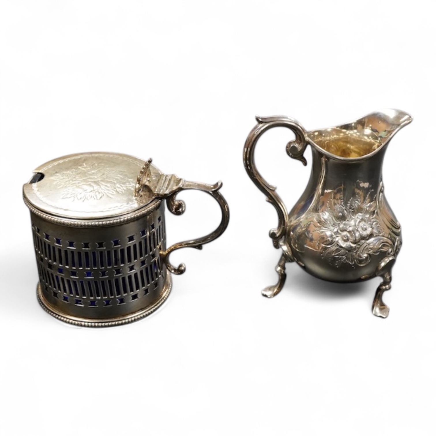 A Victorian pierced silver drum mustard por and cream jug first heoght 6cm., weight approx. 5.79ozt